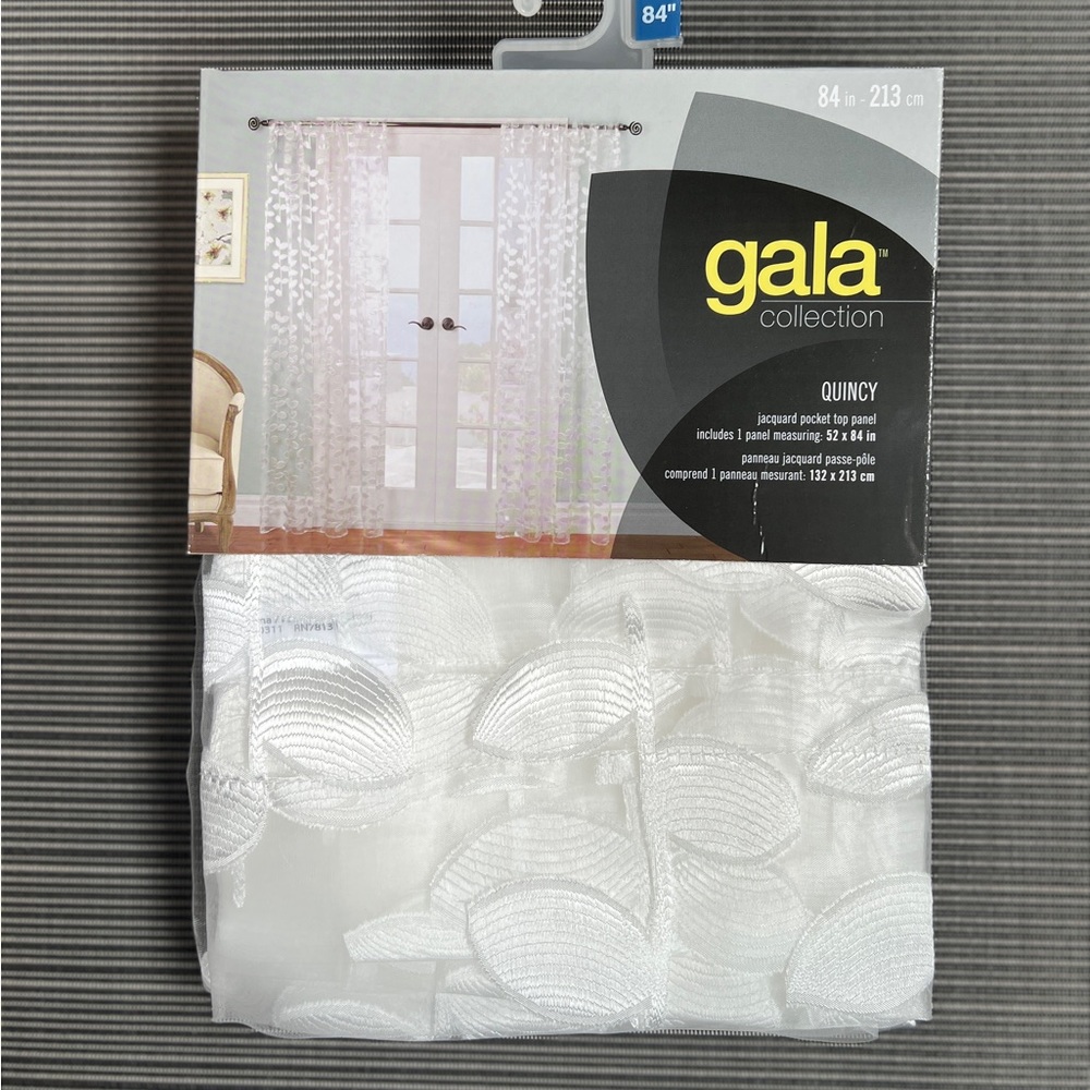 *new* pair of sheer white embroidered curtains